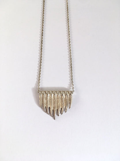 Pendentif griffe